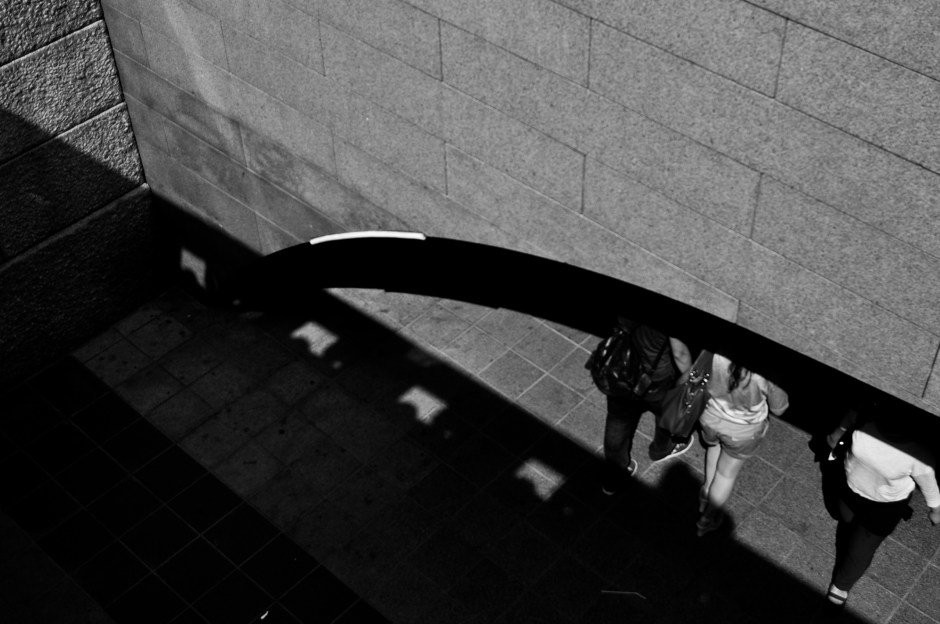A couple passes under a small arch at the Cheonggyecheon, Seoul