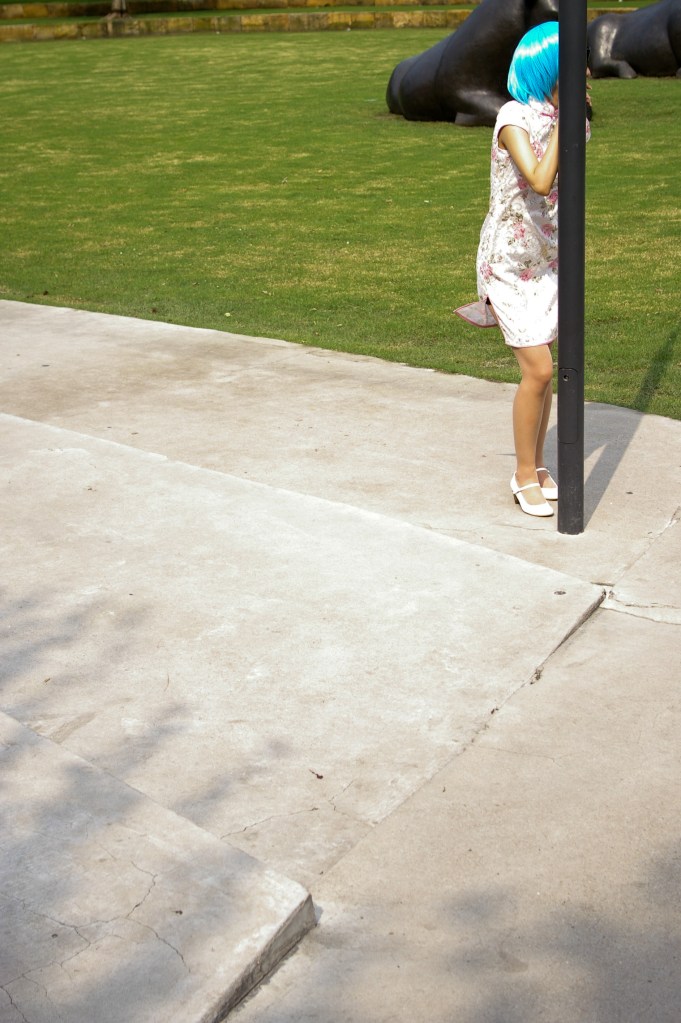 A cosplayer poses in Jing'an Sculpture Park