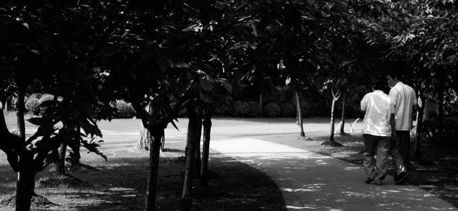 Two men take a stroll through the Jing'an Sculpture Park