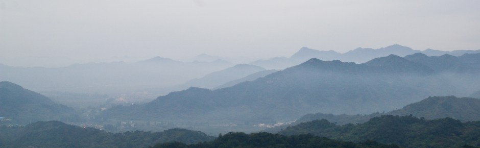 Misty mountains surrounding the Great Wall of China