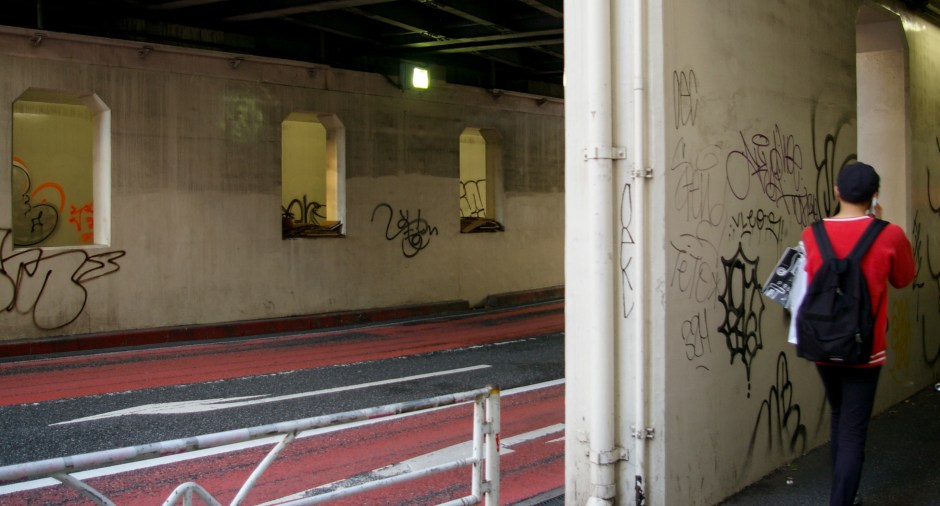 Colors, textures, and graffiti in a Tokyo underpass.